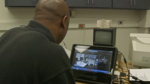 Jeff Robinson working on video with Mediasite.